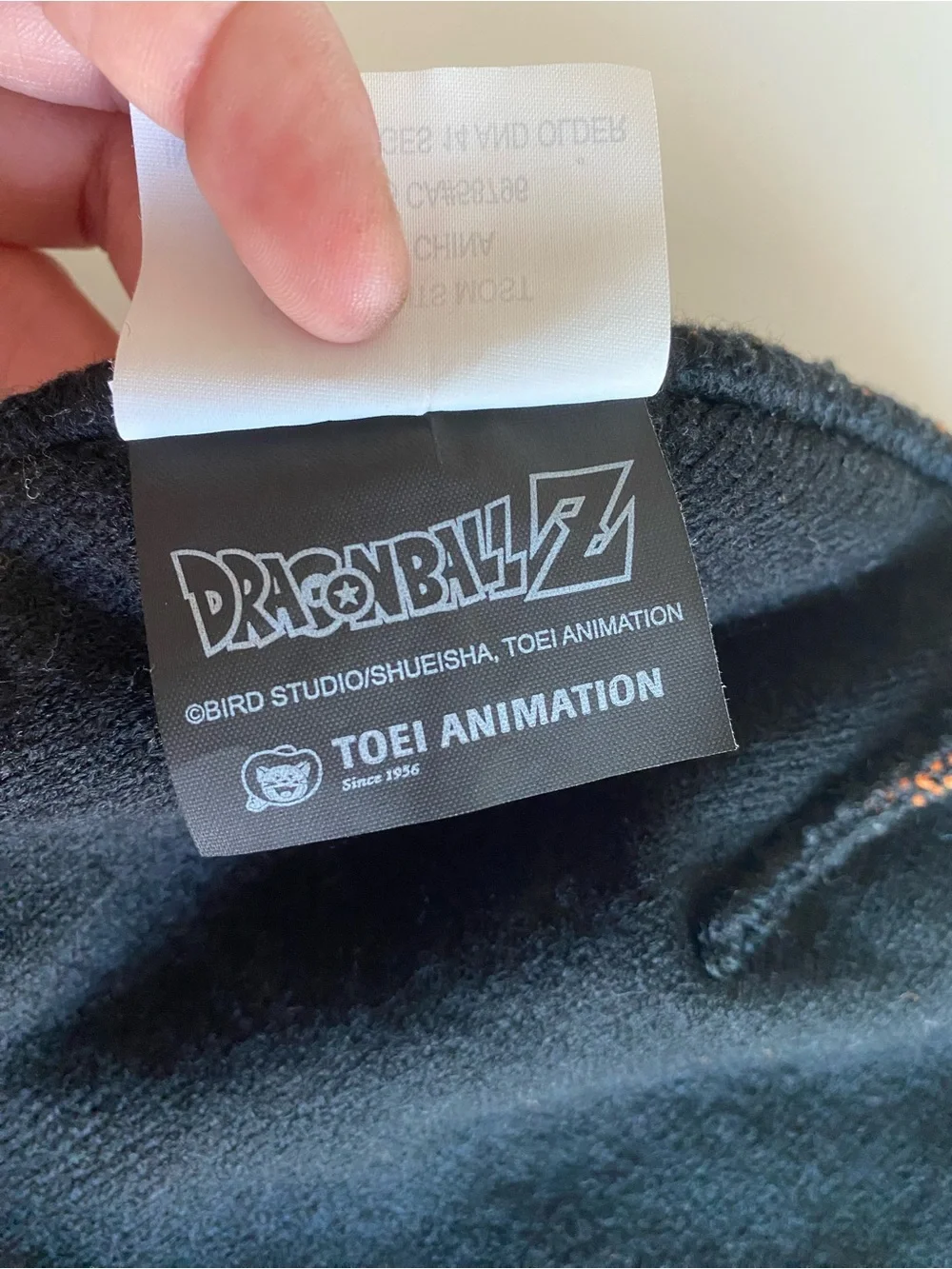 Black and Orange Graphic Knit Beanie Hat